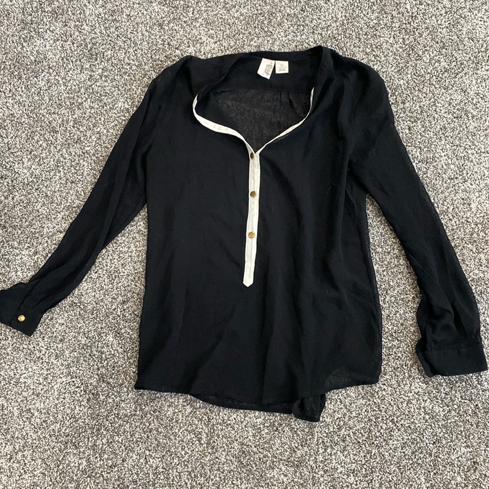 Sheer black top with gold buttons